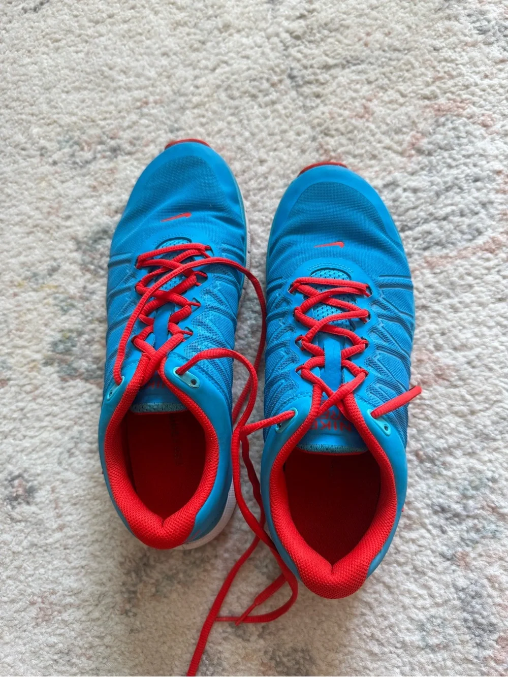 Nike Blue Athletic Shoes with Red Laces